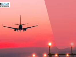 Jharkhand Small Cities to Get Flights Under UDAN Airplane landing at sunset with runway lights glowing, symbolizing aviation connectivity and regional air travel in India.