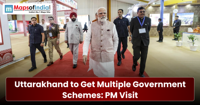 Prime Minister Narendra Modi walking on a red carpet at an event in Uttarakhand.