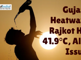 Silhouette of a person pouring water during intense heat as Gujarat’s Rajkot records 41.9°C amid a heatwave alert.