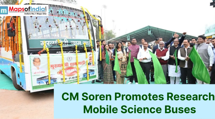 CM Soren Promotes Research, Mobile Science Buses Jharkhand CM Hemant Soren flags off a decorated mobile science exhibition bus with officials holding green flags at a public event.