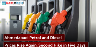 Ahmedabad: Petrol and Diesel Prices Rise Again, Second Hike in Five Days Close-up of colorful fuel nozzles at a gas station with text about rising petrol and diesel prices in Ahmedabad.