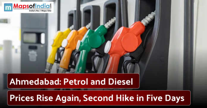 Close-up of colorful fuel nozzles at a gas station with text about rising petrol and diesel prices in Ahmedabad.