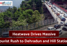 Heatwave Drives Massive Tourist Rush to Dehradun and Hill Stations Heavy traffic on a bridge near Dehradun as tourists head toward hill stations during a summer heatwave.