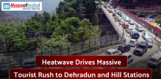 Heatwave Drives Massive Tourist Rush to Dehradun and Hill Stations Heavy traffic on a bridge near Dehradun as tourists head toward hill stations during a summer heatwave.