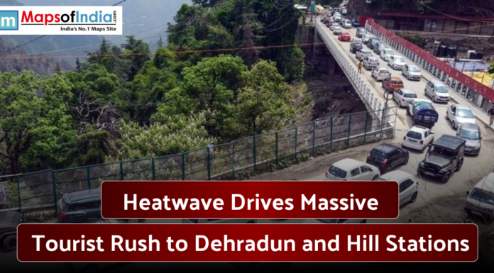 Heatwave Drives Massive Tourist Rush to Dehradun and Hill Stations Heavy traffic on a bridge near Dehradun as tourists head toward hill stations during a summer heatwave.