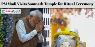 PM Modi Visits Somnath Temple for Ritual Ceremony PM Narendra Modi offers prayers during a ritual ceremony at Somnath Temple beside a decorated Nandi idol.