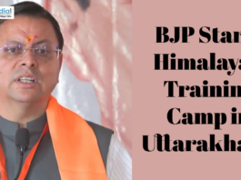 Political leader speaking at an event with text about BJP’s Himalayan training camp in Uttarakhand.