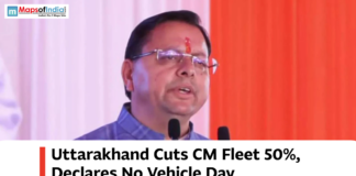Uttarakhand Cuts CM Fleet 50%, Declares No Vehicle Day Uttarakhand Chief Minister speaking at an event with text about reducing the CM fleet and declaring No Vehicle Day.