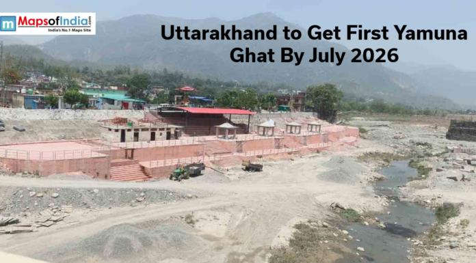 Uttarakhand to Get First Yamuna Ghat By July 2026 View of the newly developed Yamuna Ghat in Uttarakhand with riverbank structures, mountains, and text announcing completion by July 2026.