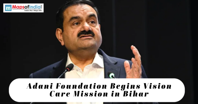 Business leader Gautam Adani speaking at an event, with text highlighting the Adani Foundation's vision care mission initiative in Bihar.