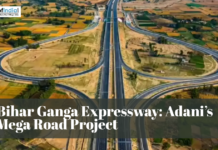 Bihar Ganga Expressway: Adani’s Mega Road Project Aerial view of the proposed Bihar Ganga Expressway, showcasing a large highway interchange and road infrastructure across agricultural land.