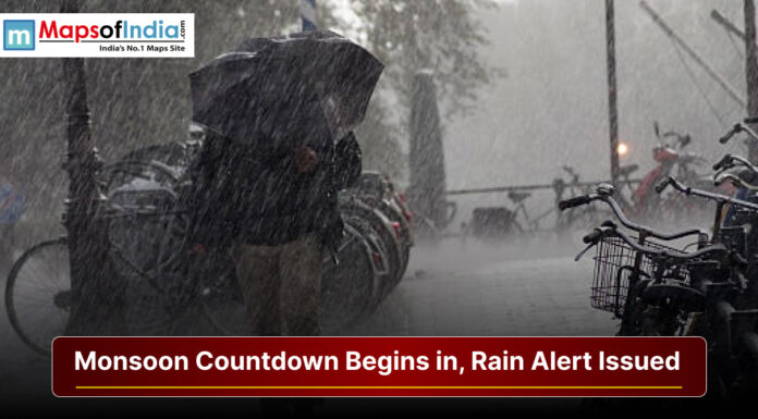 Monsoon Countdown Begins in Uttarakhand, Rain Alert Issued Heavy rainfall during monsoon season with a rain alert warning and people using umbrellas on a city street.