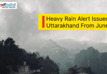 Heavy Rain Alert Issued for Uttarakhand From June 11 Dark rain clouds over the hills of Uttarakhand during heavy rainfall with an alert announcing heavy rain from June 11.