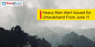 Heavy Rain Alert Issued for Uttarakhand From June 11 Dark rain clouds over the hills of Uttarakhand during heavy rainfall with an alert announcing heavy rain from June 11.